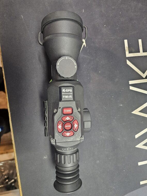 Digital night vision scope with buttons and Wi-Fi capability, featuring a lens and adjustable settings.